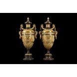 A LARGE AND IMPRESSIVE PAIR OF LATE 19TH / 20TH CENTURY FRENCH BRONZE URNS AND COVERS IN THE MANNER