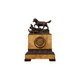 A SECOND QUARTER 19TH CENTURY FRENCH BRONZE AND SIENNA MARBLE CLOCK DEPICTING A DOG BY PONS OF PARIS