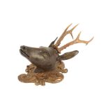 A LATE 19TH CENTURY AUSTRIAN CARVED WOOD AND ANTLER DEER HEAD TROPHY