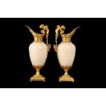 A FINE PAIR OF 19TH CENTURY FRENCH CARRARA MARBLE AND ORMOLU EWERS