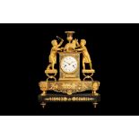 A VERY RARE AND FINE EMPIRE PERIOD GILT BRONZE MANTEL CLOCK DEPICTING TWO BOYS WITH A CAT CIRCA 1810