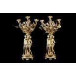 A LARGE PAIR OF 19TH CENTURY FRENCH GILT BRONZE FIGURAL CANDELABRA AFTER THE MODEL BY ETIENNE-MAURIC