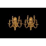 A FINE PAIR OF EARLY 20TH CENTURY FRENCH GILT BRONZE FIVE LIGHT WALL LIGHTS