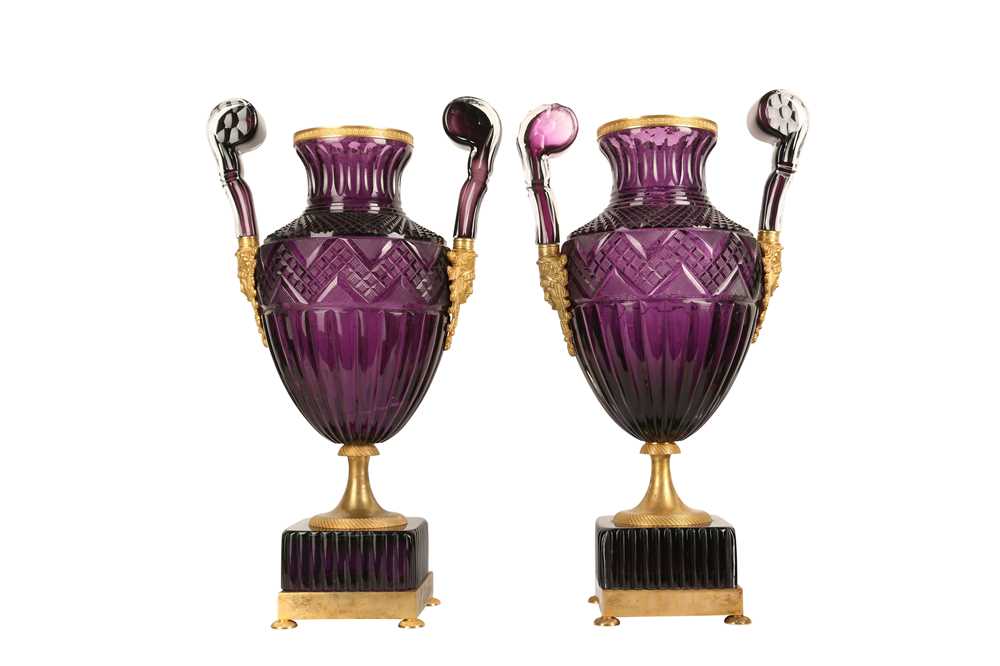 A PAIR OF LARGE 20TH CENTURY RUSSIAN AMETHYST GLASS AND ORMOLU MOUNTED VASES AFTER THE MODEL BY THE