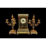 A LATE 19TH CENTURY FRENCH ONYX AND CLOISONNE ENAMEL CLOCK GARNITURE