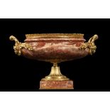 AN EARLY 20TH CENTURY HARD STONE AND ORMOLU MOUNTED JARDINIERE