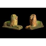 A PAIR OF 19TH / EARLY 20TH CENTURY TERRACOTTA MODELS OF RECLINING LIONS