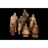 AN 18TH CENTURY PORTUGUESE COLONIAL FIGURE OF THE VIRGIN TOGETHER WITH SEVEN FURTHER FIGURES