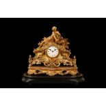 A MID 19TH CENTURY FRENCH GILT BRONZE FIGURAL MANTEL CLOCK DEPICTING 'STUDY'