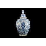 A LARGE 18TH / 19TH CENTURY DELFT BLUE AND WHITE TIN GLAZED EARTHENWARE JAR AND COVER