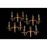 A SET OF FOUR EARLY 20TH CENTURY FRENCH CHINOISERIE STYLE GILT BRONZE WALL LIGHTS