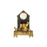 AN EARLY 19TH CENTURY FRENCH EMPIRE PERIOD GILT AND PATINATED BRONZE FIGURAL MANTEL CLOCK 'THE MILKM