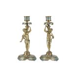A PAIR OF LATE 19TH CENTURY FRENCH BRONZE AND CHAMPLEVE ENAMEL FIGURAL CANDLESTICKS