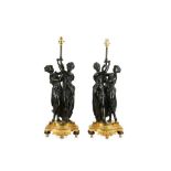 A PAIR OF LATE 19TH / EARLY 20TH CENTURY FRENCH BRONZE FIGURAL LAMP BASES IN THE MANNER OF FALCONET