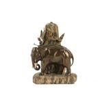 AN EARLY 20TH CENTURY VIENNESE PATINATED AND PAINTED ALABASTER LAMP DEPICTING A MAN WITH ELEPHANT IN