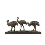 A BRONZE ANIMALIER STYLE SCULPTURE OF THREE OSTRICHS