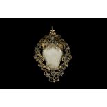 A 17TH CENTURY VENETIAN GILT METAL AND ROCK CRYSTAL RELIQUARY PENDANT