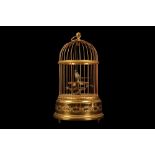 A 20TH CENTURY SWISS SINGING BIRD IN CAGE BY REUGE
