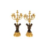 A VERY LARGE PAIR OF MID 19TH CENTURY GILT AND PATINATED BRONZE FIGURAL CANDELABRA CIRCA 1860 AFTER