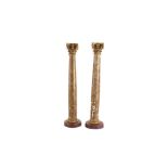 A PAIR OF 19TH CENTURY BAROQUE STYLE PAINTED AND GILTWOOD CORINTHIAN COLUMNS, PROBABLY ITALIAN