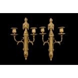 A PAIR OF 19TH CENTURY FRENCH GILT BRONZE LOUIS XVI STYLE TWIN BRANCH WALL LIGHTS