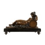 A 20TH CENTURY BRONZE FIGURE OF A NUDE RECLINING BACCHANTE