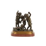 A 19TH CENTURY FRENCH BRONZE FIGURAL GROUP OF FROLICKING PUTTI WITH A GOAT