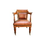 ROYAL INTEREST: A 19TH CENTURY MAHOGANY LIBRARY CHAIR STAMPED WITH BUCKINGHAM PALACE INVENTORY NO.