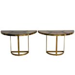 A PAIR OF SMOKED GLASS AND GILT-METAL DEMI LUNE CONSOLE TABLES