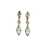 A pair of blue topaz and diamond earrings