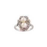 A cultured pearl and diamond dress ring