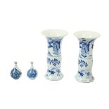 AMENDED DESCRIPTION: A PAIR OF CHINESE BLUE AND WHITE GU VASES, IN THE KANGXI STYLE