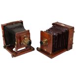 A Pair of Half Plate Mahogany Field Cameras