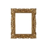 A FLORENTINE EARLY 20TH CENTURY CARVED, PIERCED AND GILDED FRAME