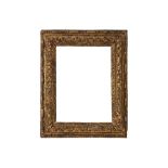 A FRENCH LOUIS XIII CARVED AND GILDED FRAME
