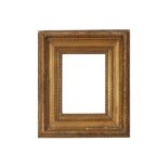 A LOUIS XVI CARVED AND COMPOSITION GILDED FRAME