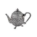 A late 19th century Anglo – Indian unmarked silver teapot, Cutch circa 1880
