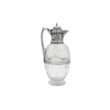 A Victorian sterling silver mounted claret jug, London 1899 by John Grinsell and Sons