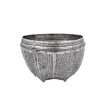 An early 20th century Burmese unmarked silver bowl or food measure, possibly Shan States circa 1900