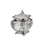 A large and unusual Victorian sterling silver tea caddy or biscuit box, London 1844 by John Edward