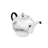 An early 20th century Iraqi silver and niello teapot, circa 1930 signed Omara, Amer, Raheem