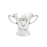 A large Edwardian ‘Art Nouveau’ sterling silver twin handled cup, Edinburgh 1908 makers mark obscure