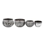 A mixed group of four early 20th century Southeast Asian unmarked silver bowls, circa 1930