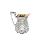 A Victorian sterling silver milk jug, London 1856 by Edward & John Barnard