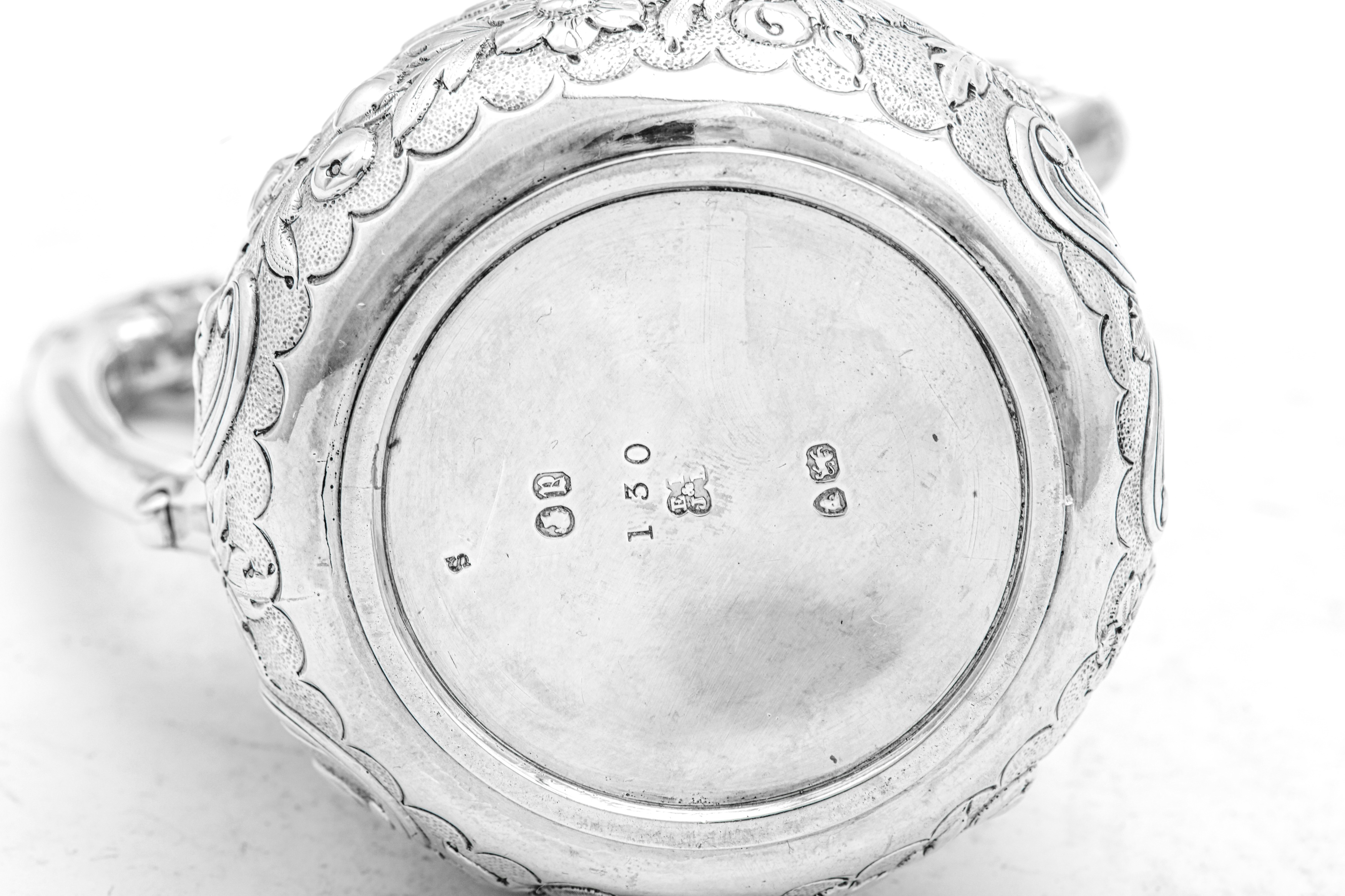 A Victorian sterling silver milk jug, London 1856 by Edward & John Barnard - Image 4 of 4