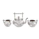 An early 20th century Chinese Export silver three-piece tea service, Canton circa 1900 retailed by W