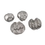 Four small mid-20th Cambodian unmarked silver lime or betel boxes, circa 1950