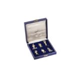 A cased set of Elizabeth II sterling silver novelty Workers of London place card holders, London 197