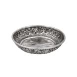 An early to mid-20th century Balinese (Indonesian) unmarked silver flower offering bowl, circa 1940
