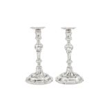 An unusual pair of George II sterling silver candlesticks, London 1754 by John Wirgman (reg. 13th Ma